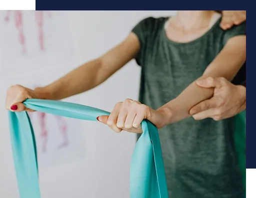 A person holding onto some blue fabric